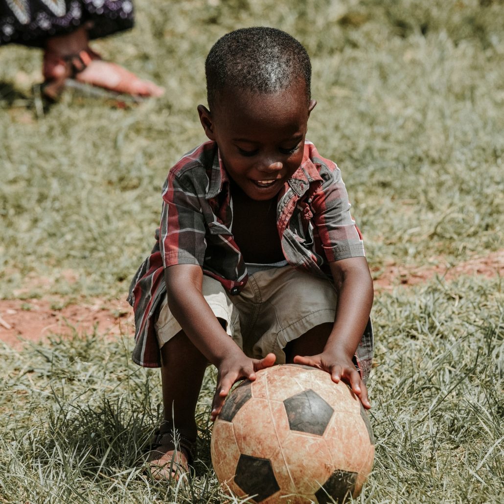 Children Playing Soccer In Africa