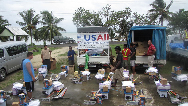 A group using USAID prepares a work crew for disaster relief