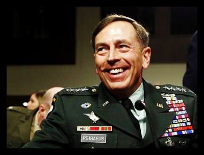 u-s-general-david-petraeus-smiles-as-he-prepares-to-testify-USAID_international_aid_opt